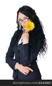 Young charming business woman in dark dress playing with a yellow flower