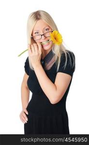 Young charming business woman in dark dress playing with a yellow flower