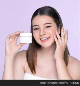 Young charming girl with natural beauty, perfect smooth skin hold lotion, cream, moisturizer jar. Beautiful girl show skincare product smiling on isolated background.. Young charming girl with natural beauty hold lotion jar.