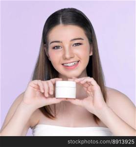 Young charming  girl with natural beauty, perfect smooth skin hold lotion, cream, moisturizer jar. Beautiful  girl show skincare product smiling on isolated background.. Young charming  girl with natural beauty hold lotion jar.
