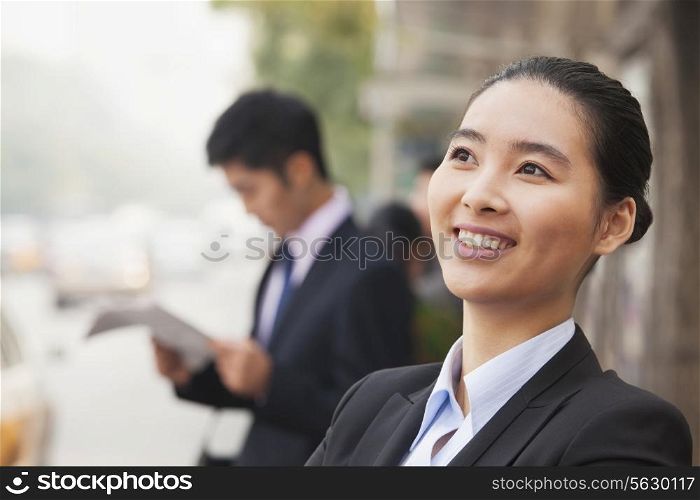 Young Cheerful Businesswoman in Beijing, China, portrait