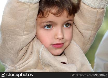 Young child in a warm coat