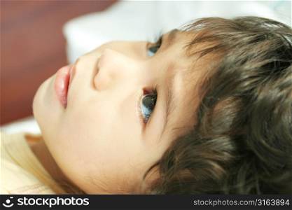 Young child laying down