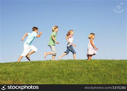 Young children running through field