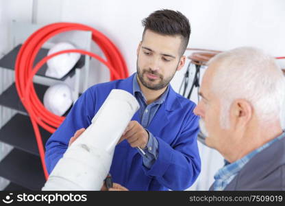 young civil engineer with master during training