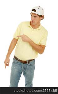 Young college age man pointing off camera in disgust or skepticism. Isolated on white.