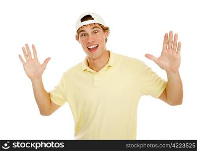 Young college age man throws up his hands in surprise. Isolated on white.