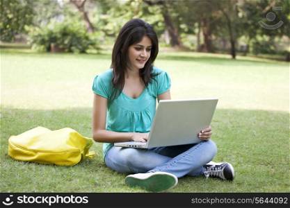 Young college student surfing net