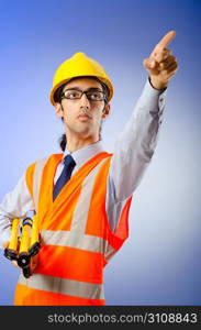 Young construction worker with hard hat