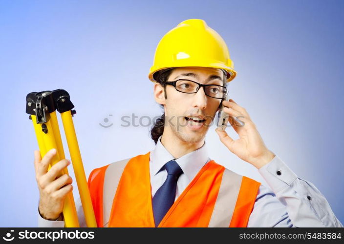 Young construction worker with hard hat