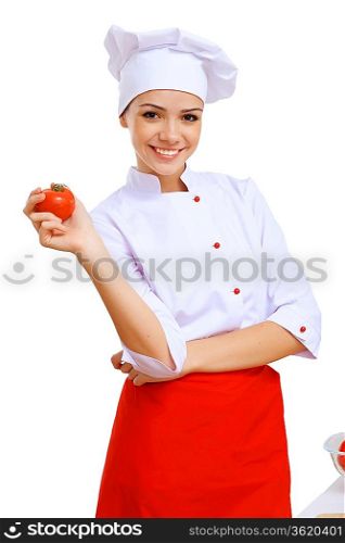Young cook preparing food from fresh vegetables