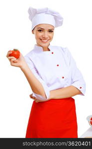 Young cook preparing food from fresh vegetables