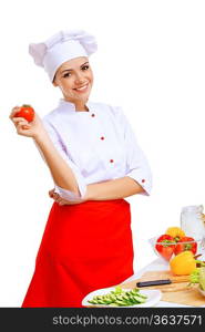 Young cook preparing food from fresh vegetables