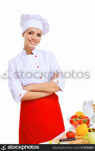 Young cook preparing food from fresh vegetables