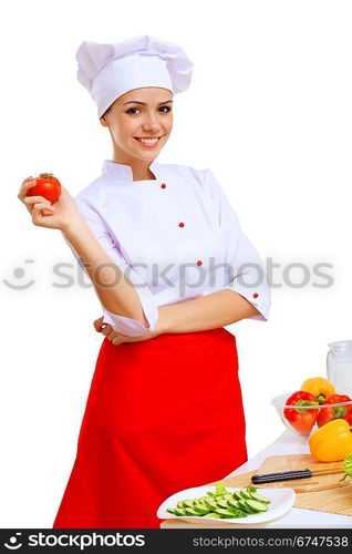 Young cook preparing food from fresh vegetables