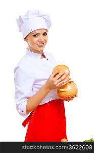 Young cook preparing food wearing a red apron