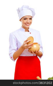 Young cook preparing food wearing a red apron