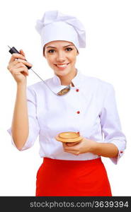 Young cook preparing food wearing a red apron