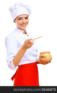 Young cook preparing food wearing a red apron