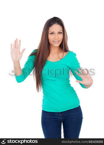 Young cool woman saying stop isolated on a white background