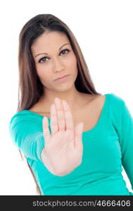 Young cool woman saying stop isolated on a white background