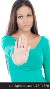Young cool woman unfocused saying stop isolated on a white background