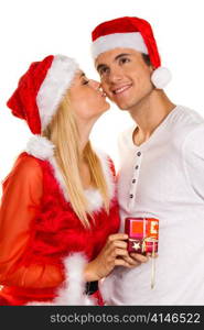 young couple at christmas with santa claus hats
