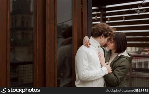 young couple being close with copy space