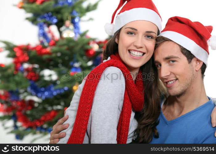 Young couple celebrating Christmas