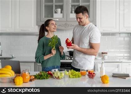 young couple cooking home_2