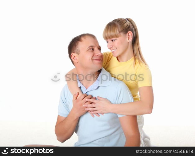 young couple doing yoga exercise together indoors