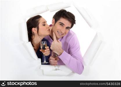 Young couple drinking champagne together
