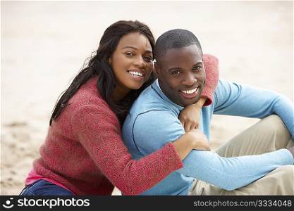 Young couple Embracing on beach
