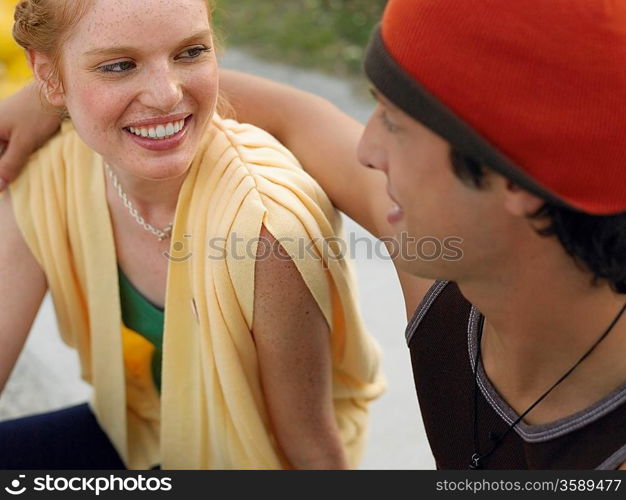 Young couple embracing outdoors