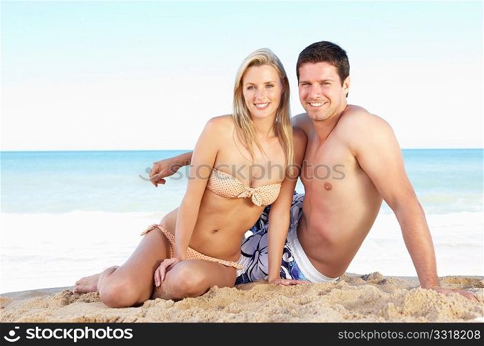 Young Couple Enjoying Beach Holiday