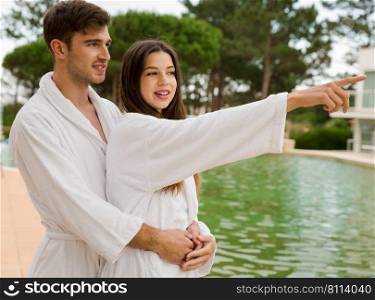 Young couple enjoying vacations in a hotel