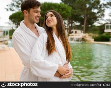 Young couple enjoying vacations in a hotel