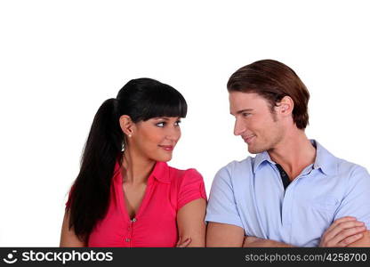 Young couple flirting in a studio