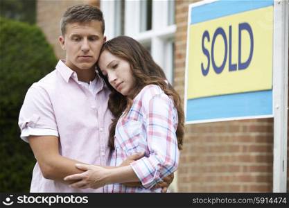 Young Couple Forced To Sell Home Through Financial Problems