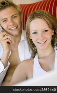 Young Couple Hanging Out Poolside