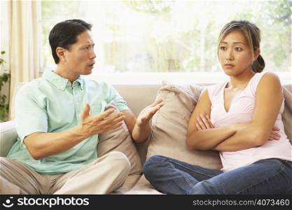 Young Couple Having Argument At Home