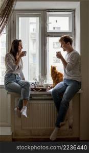 young couple having breakfast