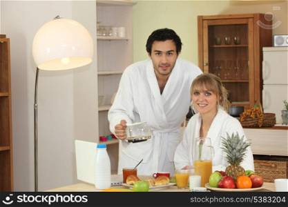 young couple having breakfast together