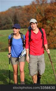 Young couple hiking in countryside