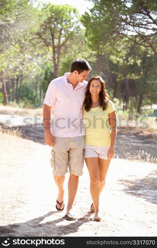 Young couple, holding hands, walking,walk in park