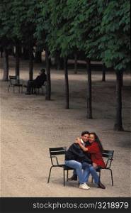 Young Couple Hugging in Park