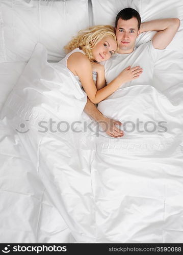 Young couple in a bed