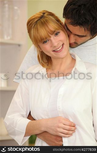 Young couple in a gentle embrace