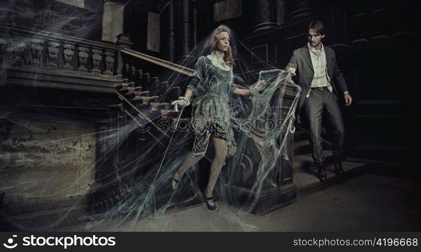 Young couple in an old house