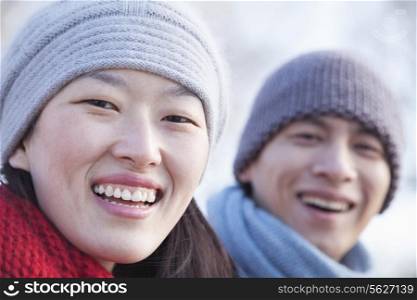 Young Couple In Beijing in the Winter, Close Up on Face